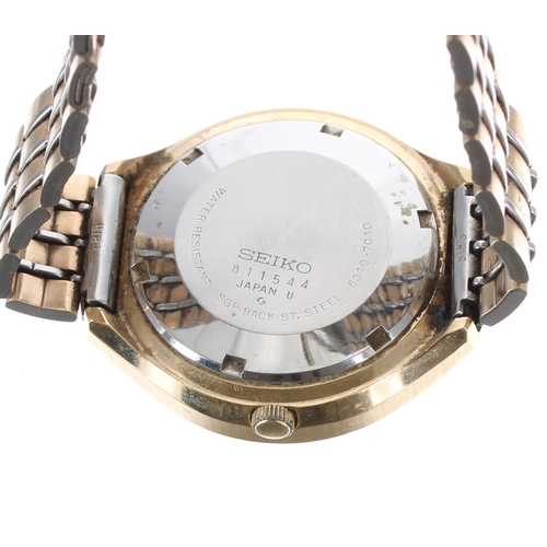 126 - Seiko 5 Helmet automatic gold plated gentleman's wristwatch, ref. 6319-7010, the black dial with day... 