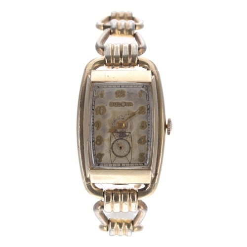 138 - Bulova 10k gold filled midsize wristwatch, case no. 09448xx, silvered dial with Arabic numerals and ... 