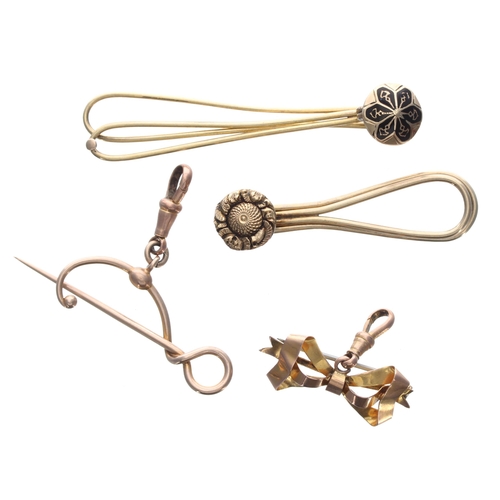 348 - Two 9ct bow fob watch brooches with clasps, also two similar yellow metal hinged clips, 12.1gm in to... 