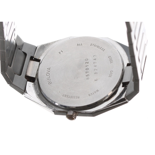 590 - Bulova Quartz stainless steel gentleman's wristwatch in need of repair, with original bracelet, 32mm... 