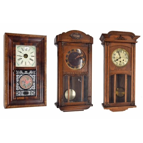 1695 - Seph Thomas mahogany two train ogee wall clock, 27