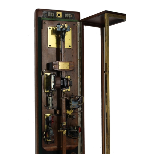 1096 - Interesting and unusual electric master tall wall clock, the electrics and brass bob pendulum housed... 