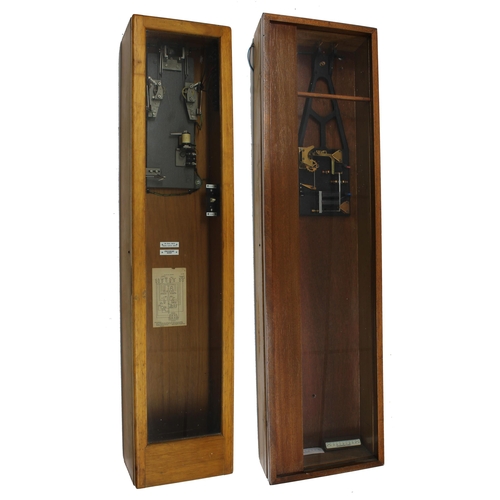 1104 - Gent electric master wall clock within a light oak glazed case, 50.5