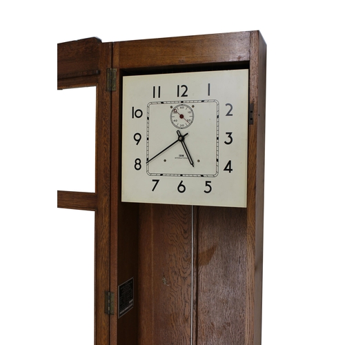 1112 - IBM International oak electric master clock, the 12