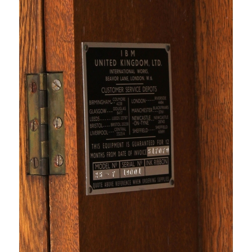 1112 - IBM International oak electric master clock, the 12