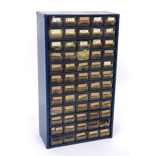 663 - Sixty drawer storage unit containing a quantity of various sized watch glasses