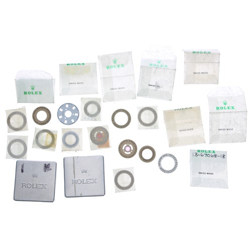 621 - Rolex - assortment of date wheels in packets, with two Rolex vintage aluminium parts tin (14) (inclu... 