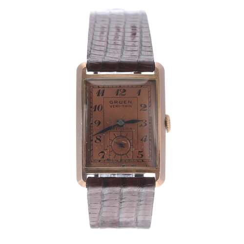 187A - Gruen Veri-Thin Precision 10k gold filled rectangular curved wristwatch, the bronzed dial with Arabi... 