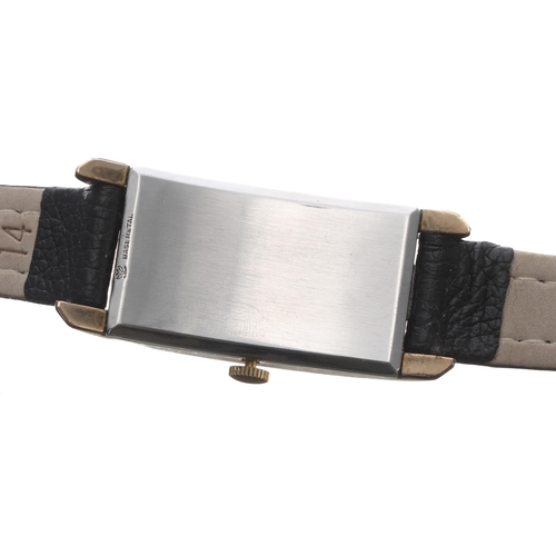 77 - Gruen gold filled and stainless steel rectangular curved gentleman's wristwatch, signed silvered dia... 