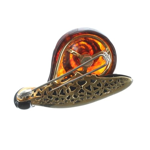 486 - Unusual 18ct mounted amber and diamond snail design brooch, set with a cabouchon ruby, 31.1gm, 57mm ... 