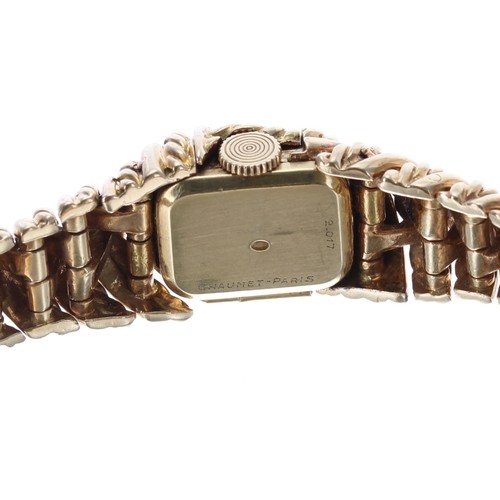 87 - Chaumet 18ct yellow gold lady's cocktail wristwatch, the champagne dial concealed by a hinged case f... 