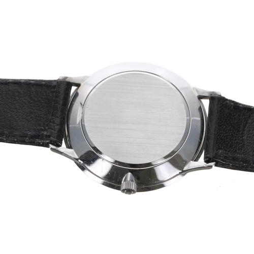 76 - Universal Genéve slim wristwatch, ref. 1-566, circular grey two tone dial with dot markers, cal. 1-4... 