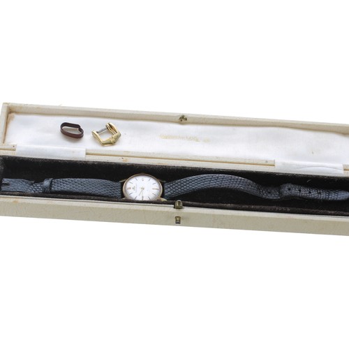 105 - Jaeger-LeCoultre 18ct lady's wristwatch, silvered dial with baton markers, case no. 961328, black st... 