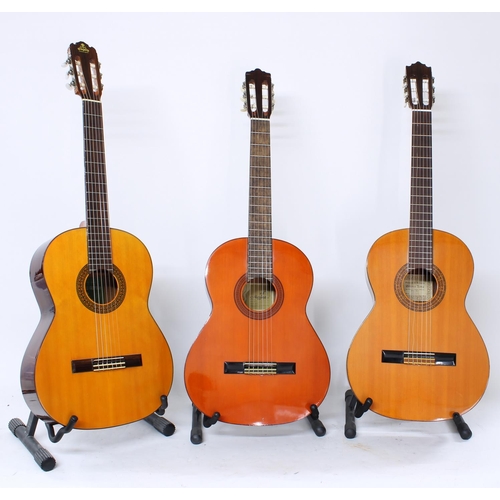 499C - 1973 Takeharu G85 classical guitar, soft bag; together with a Marina Mark II classical guitar and an... 