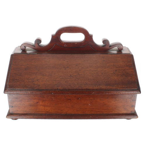 92 - Victorian mahogany cutlery box, with scroll carved handle over twin hinged covers, raised on shallow... 