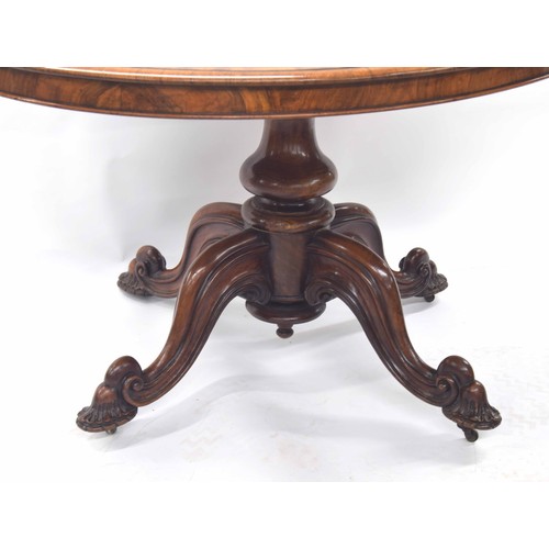 351 - Attractive Victorian walnut oval loo table of good rich colour, the figured moulded tilting top on c... 