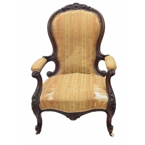 354 - Victorian mahogany framed upholstered arm chair, the frame with carved scroll to the upper back, arm... 