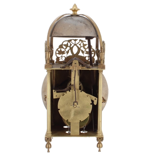 1344 - Continental brass lantern clock, the 6.75” silvered dial enclosing a foliate engraved centre, surmou... 