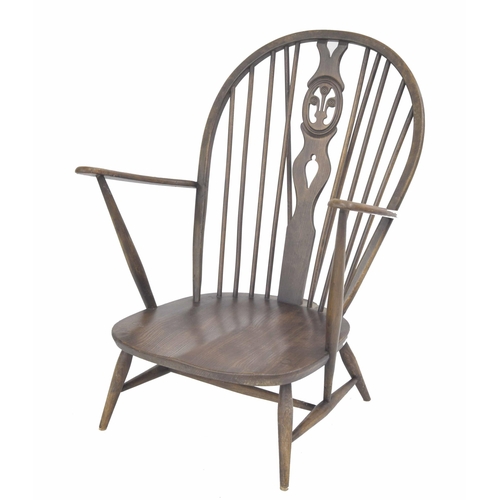 336 - Ercol Windsor nursing chair, with fleur de lys pierced splat, 30