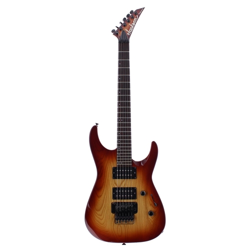 91 - 1990s Jackson Professional electric guitar, made in Japan; Body: sunburst finish, heavy buckle patch... 