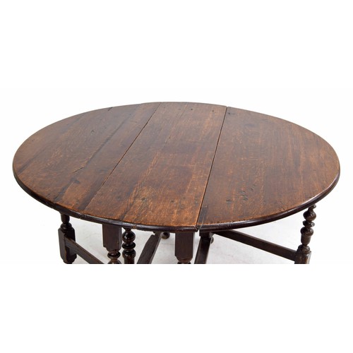 362 - 17th century oak drop-leaf dining table, 50