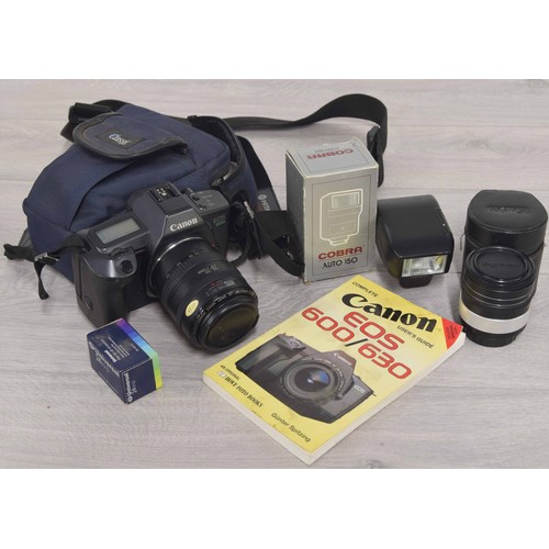 175 - Canon EOS600 SLR camera, with 28-70mm lens, user guide and carry case; also a Nikon Speedlight SB-23... 