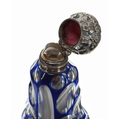 179 - Victorian blue overlaid glass scent bottle, with repousse hinged cover enclosing an inner glass stop... 