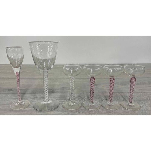 183 - Selection of early 20th century air-twist and colour twist stem cordial glasses, tallest 6.5