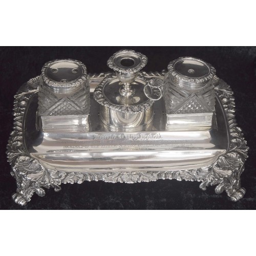 528 - Fine George IV cast silver standish, complete with small chamber stick (lacking snuffer) and two sil... 