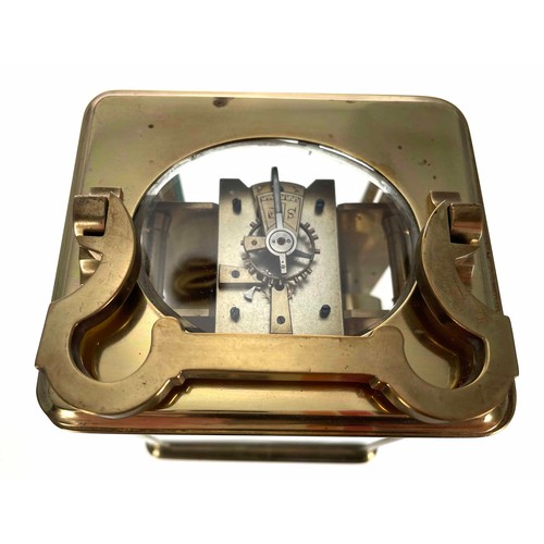 1237 - Carriage clock timepiece with alarm striking on a bell, within a corniche brass case, 7.5