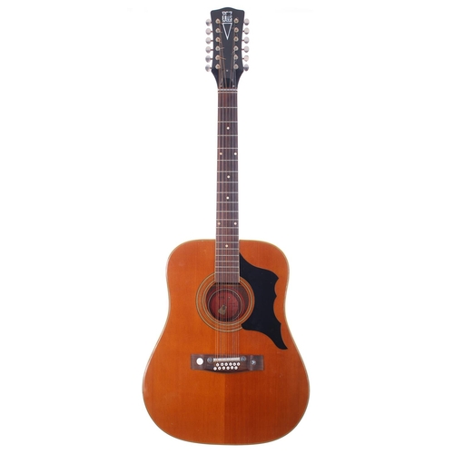 104 - Eros twelve string acoustic guitar in need of restoration, hard case (action high due to table depre... 