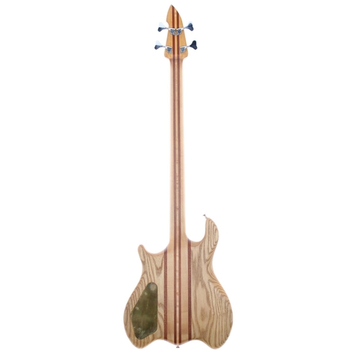 120 - Interesting good quality custom build fretless bass guitar, comprising eccentric natural wood body w... 