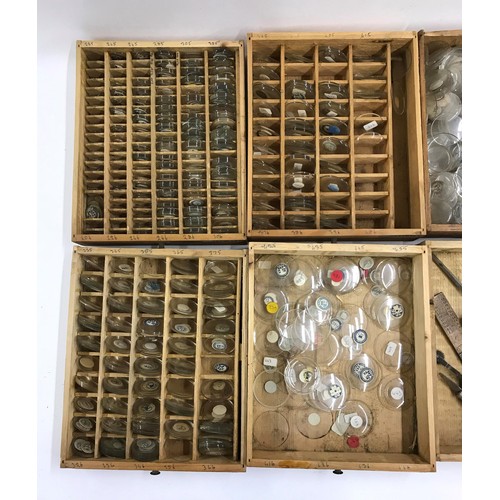 506 - Wooden chest containing a quantity of various sized watch glasses, quantity of various watch/clock m... 