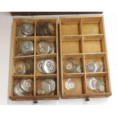 507 - Twenty four drawer wooden chest containing a large quantity of watch glasses, various sizes 94-428, ... 