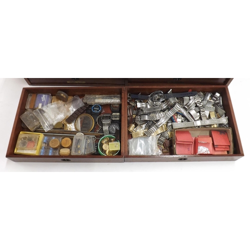 605 - Six drawer wooden chest containing an assortment of watch and clock parts, accessories and tools to ... 