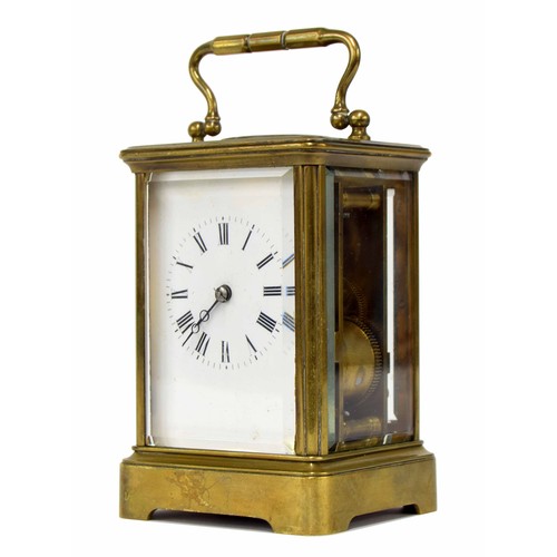 1250 - Carriage clock striking on a bell, within a corniche brass case, 6