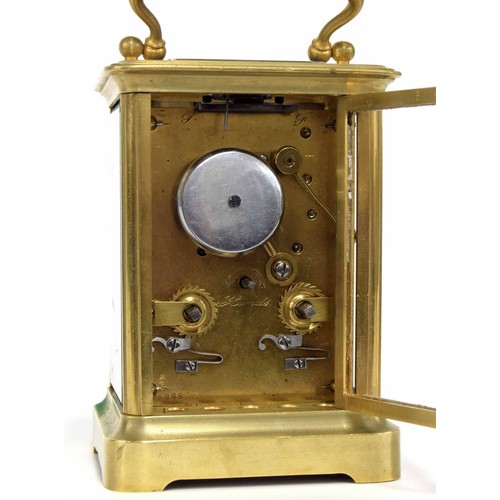 1251 - Carriage clock striking on a bell, within a corniche brass case, 6.5