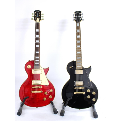 328 - Two Gould Eagle electric guitars, one in black, one in red, each with soft bag (2)