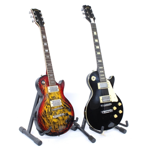 330 - Hondo LP type electric guitar; together with an Arirang LP type electric guitar, each with soft bag ... 