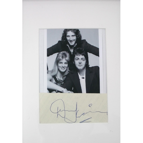 560 - Denny Laine (Wings) - autographed charity football programme, the signature obtained by the vendor f... 