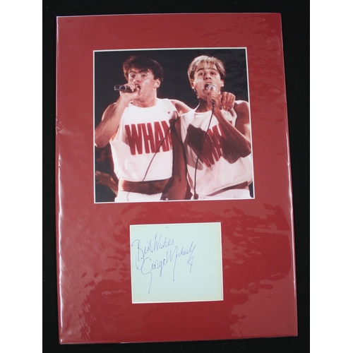 568 - Wham! - autographed display featuring George Michael to the front and Andrew Ridgeley to the reverse... 