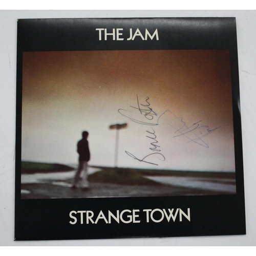 570 - The Jam - autographed 'Strange Town' vinyl single, signed to the front but with Paul Weller to the b... 