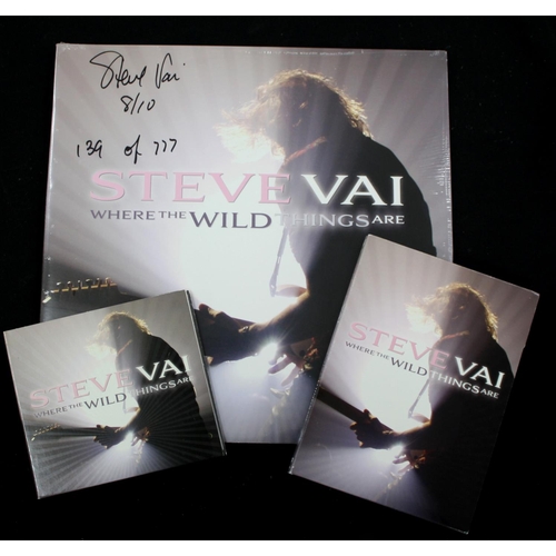 572 - Steve Vai - 'Where The Wild Things Are' vinyl, compact disc and DVD, all signed by Steve Vai, the vi... 