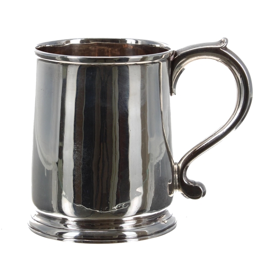 575 - George II silver tankard, with an S scroll handle upon a circular steeped foot, maker Gabriel Sleath... 