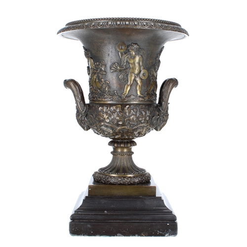 621 - Good decorative bronze campagna urn, decorated with putti and fruiting vine, with twin rams head han... 