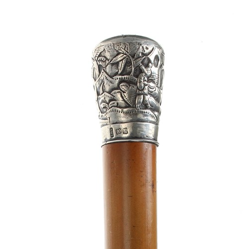 637 - Chinese silver mounted walking cane, the silver pommel decorated in relief with figures and blossom ... 