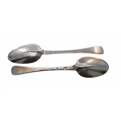 564 - Pair of early 18th century Hanoverian pattern rat tail silver table spoons, maker 'GC', probably Geo... 