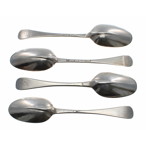 567 - Four matching early 18th Hanoverian pattern rat tail silver table spoons, one with maker's stam... 