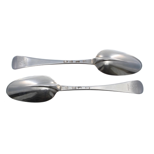 570 - Pair of George I Hanoverian rat tail pattern silver table spoons, each engraved with a knight crest,... 