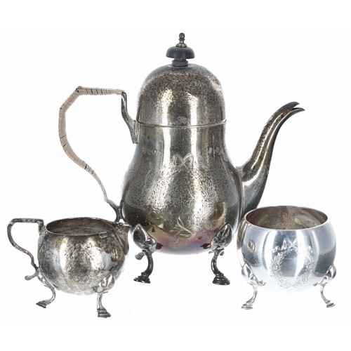 590 - Edwardian three piece silver tea set, decorated with an engraved foliate wreath cartouche, comprisin... 